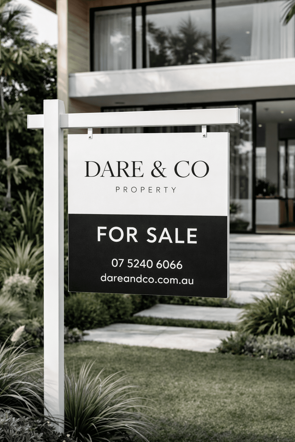 Dare & Co Property for sale sign in front of a modern home